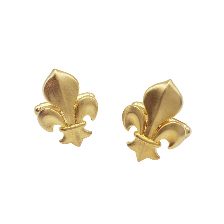 Gold fleur-de-lis earrings on a white background