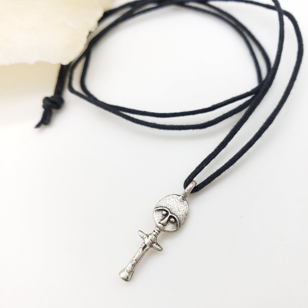 Necklace with a silver pendant on a white background