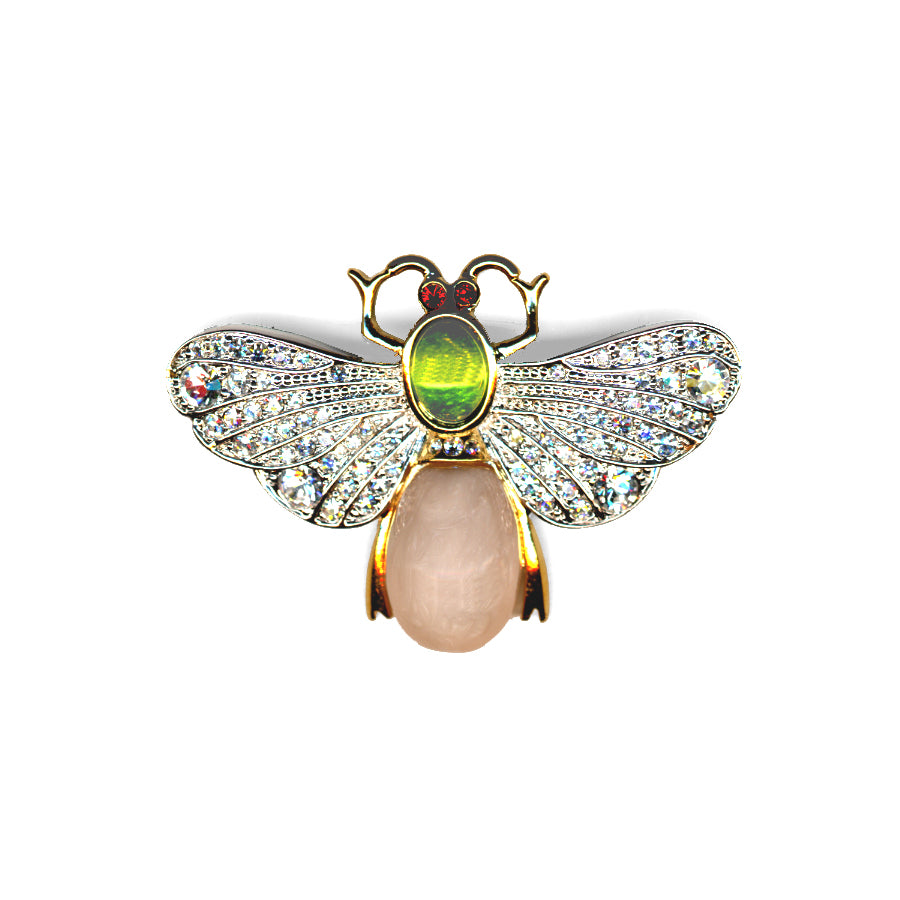Decorative butterfly with gemstones on a white background